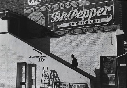 Negro going in colored entrance of movie house on Saturday afternoon, Belzoni, Mississippi Delta, Mississippi. Photo by Marion Post Wolcott. Library of Congress Prints and Photographs Division. The colored entrance to a movie house, Belzoni, Mississippi